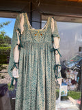 Character period green and gold gown